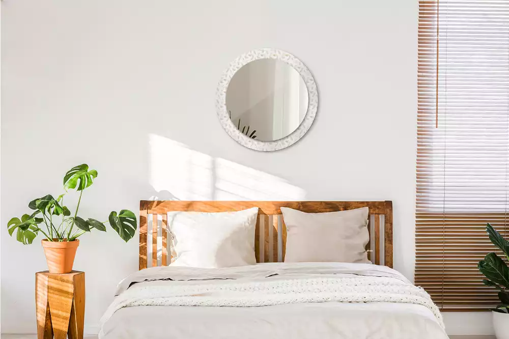 Espejo redondo con decoración plumas de pájaro